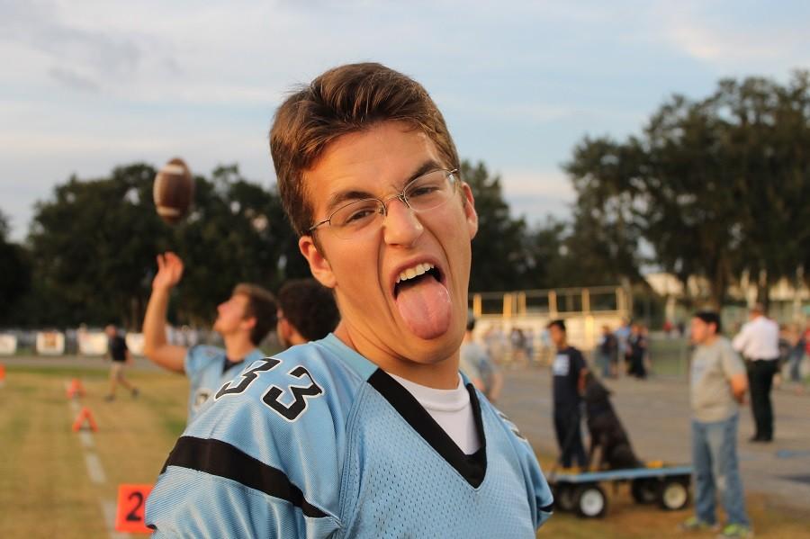 #33 Steven Springer flashes a silly face at the camera. Steven also is the swim captain for the Newsome boys swim team.